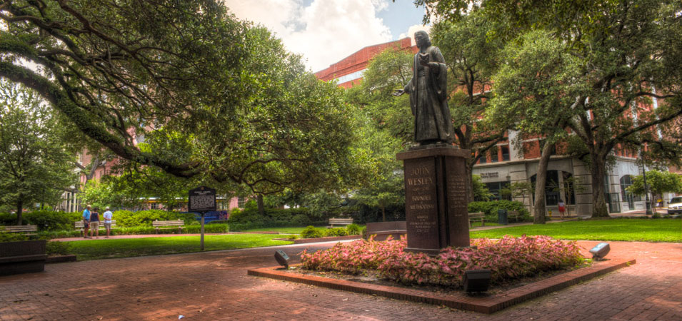 The Wesley Monument, which is the monument and statue in the center of Reynolds Square